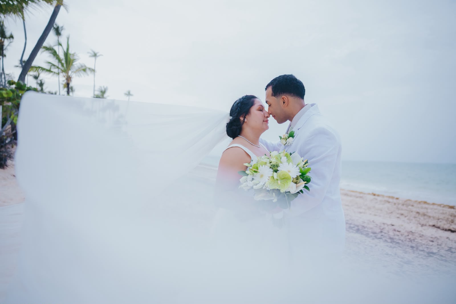 Romantic wedding photo session on the beach at Grand Palladium Punta Cana.